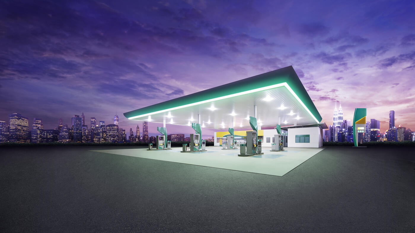picture of a gas station at night